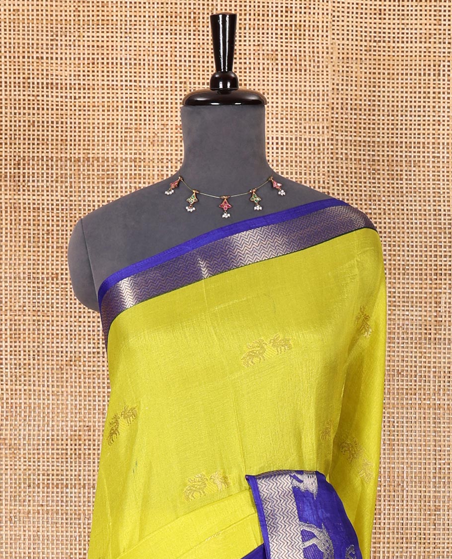 Lime yellow deer copper zari buttas dola silk saree, contrast chevron and deer motifs zari border, deer motifs pallu, and contrast deer motifs blouse