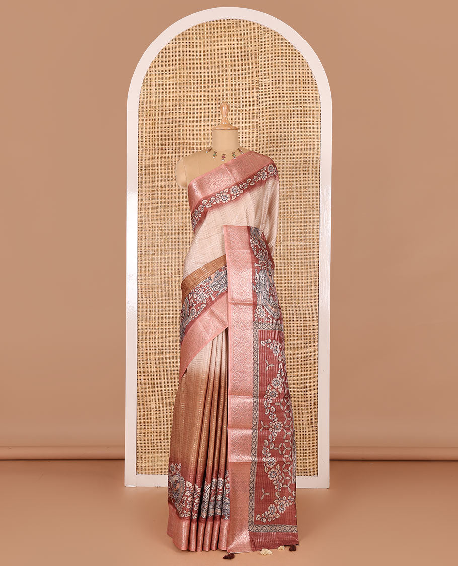 Brown tri-ombre colored zari stripes, and kalamkari peacock printed semi-tussar saree, contrast floral creeper zari border, peacock printed pallu, and a contrast blouse of zari and print work