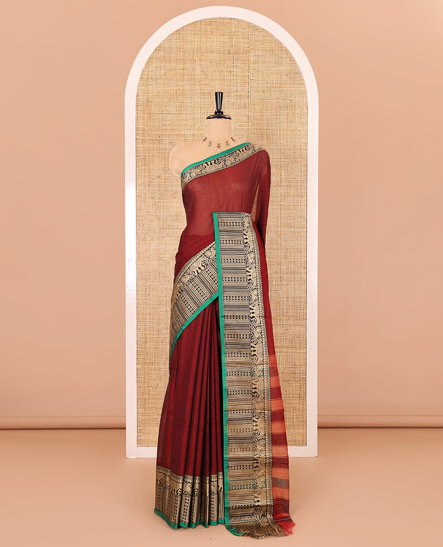 Maroon plain mercerised cotton saree, contrast traditional motifs thread woven border, striped pallu, and a matching blouse