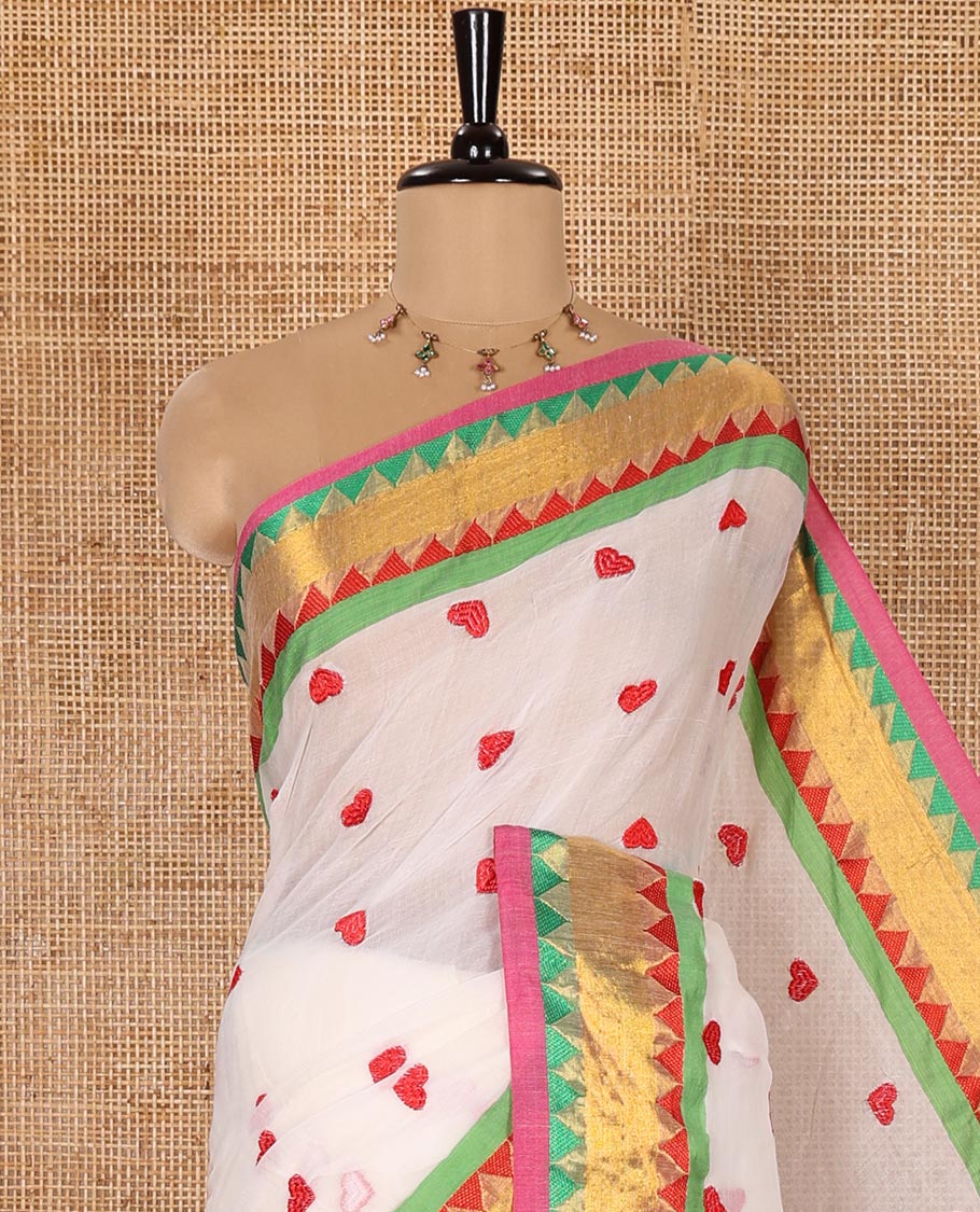 Off-White Khadi Mul Cotton Saree Accentuated with Heart Motifs Embroidery All Over Its Body, Complemented by a Contrast Tissue and Resham Thread Temple Border, Pallu Steeped with Heart Motifs Embroidery, and Paired with a Matching Blouse