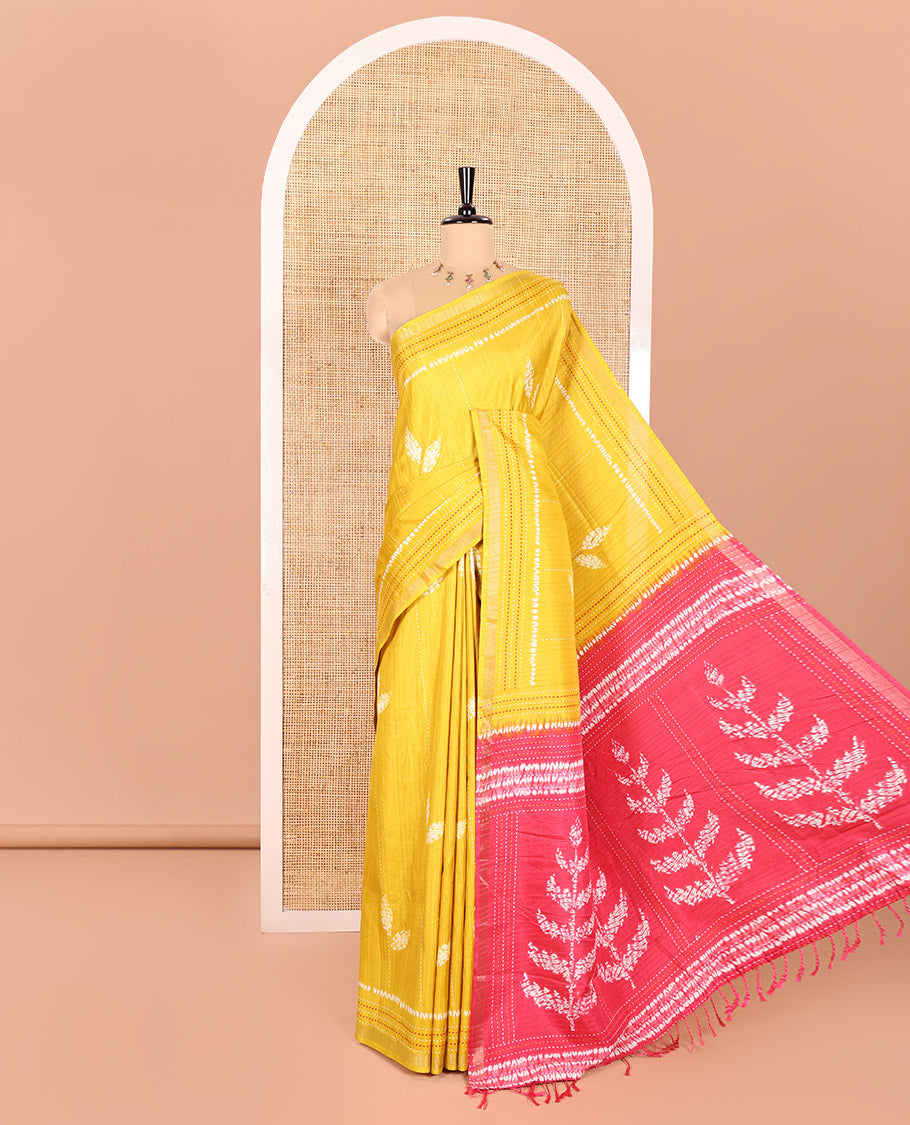 Yellow Dola Tussar Saree Decked with Shibori-Style Leaf Motifs Printed All Over Its Body, Subtly Made Zari Piping Border of Kanta Work, Complemented by Contrast Pallu of Shibori-Style Leaf Print, and Paired with Contrast Blouse