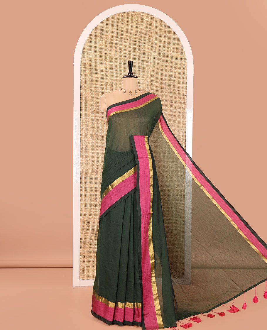Green Plain Khadi Mul Cotton Saree, Complemented by a Contrast Pink Zari Border, Plain Pallu, and Paired with a Matching Blouse