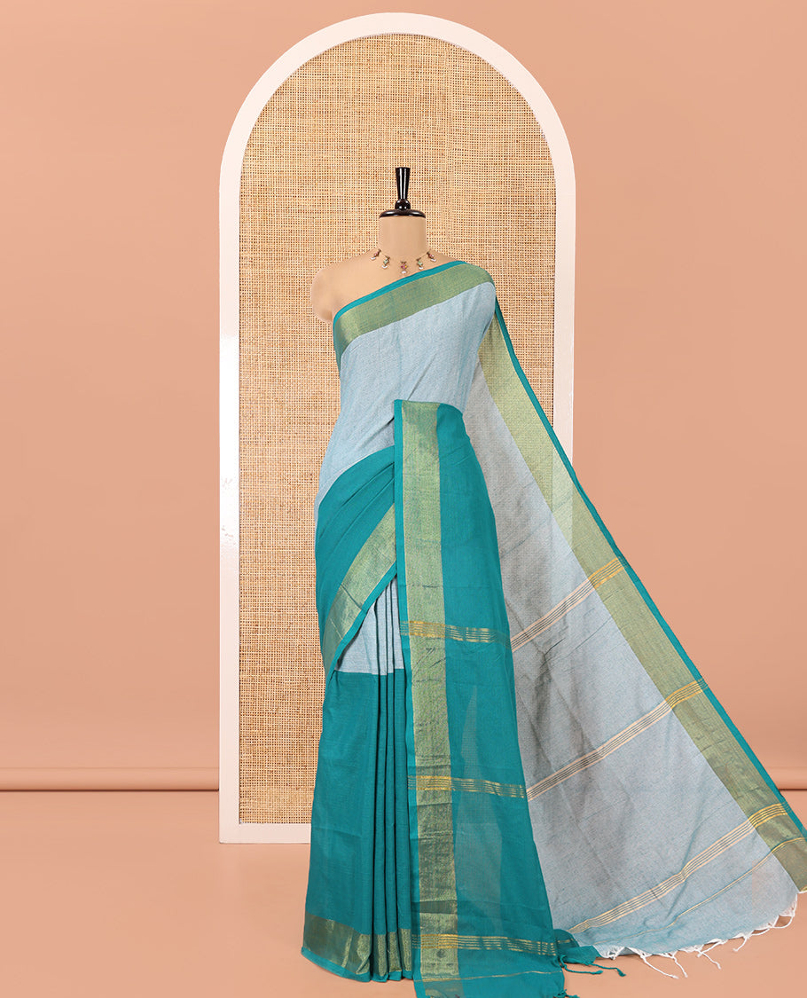 Peacock Green Khadi Mul Cotton Saree, Adorned with Half-And-Half-Style Double-Colour Dyed on Its Body, a Subtle Zari Border, Striped Pallu, and Paired with a Matching Blouse