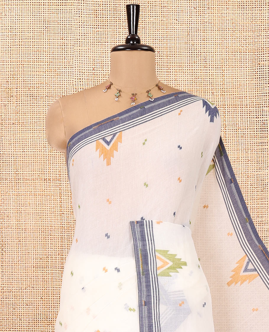 Cream Khadi Mul Cotton Saree, Enthralled with Meena Buttas All Over Its Body, Complemented by a Contrast Temple Border, Pallu of Jhamdani-Style Floral-Bird Weaving, and Paired with a Matching Blouse