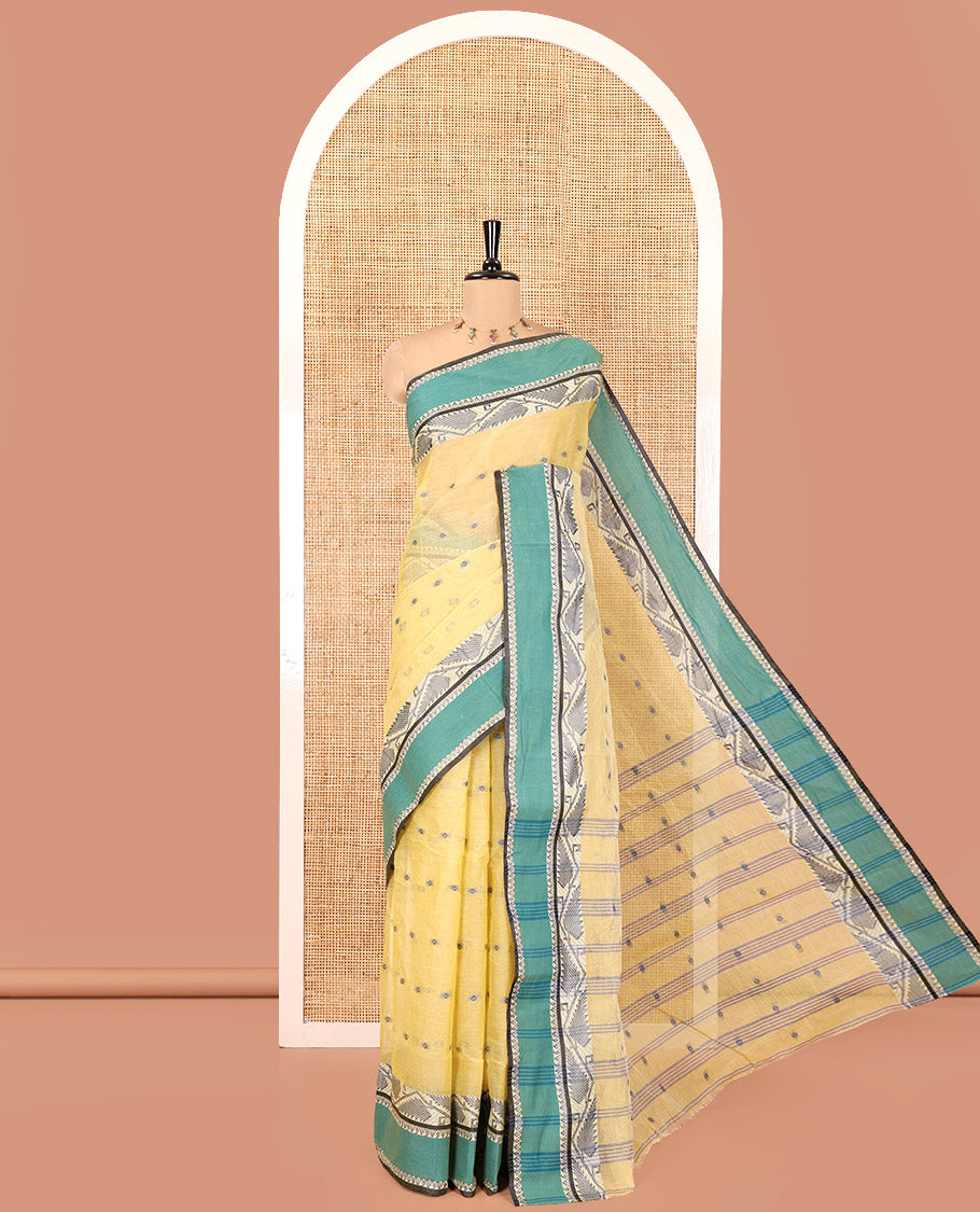 Yellow Bengal Cotton Saree, Subtly Sparkled with Thread Buttas on Its Body, Complemented by Contrast Thread Border of Floral Creeper Designs, Pallu of Stripes and Buttas, and Paired with a Matching Blouse