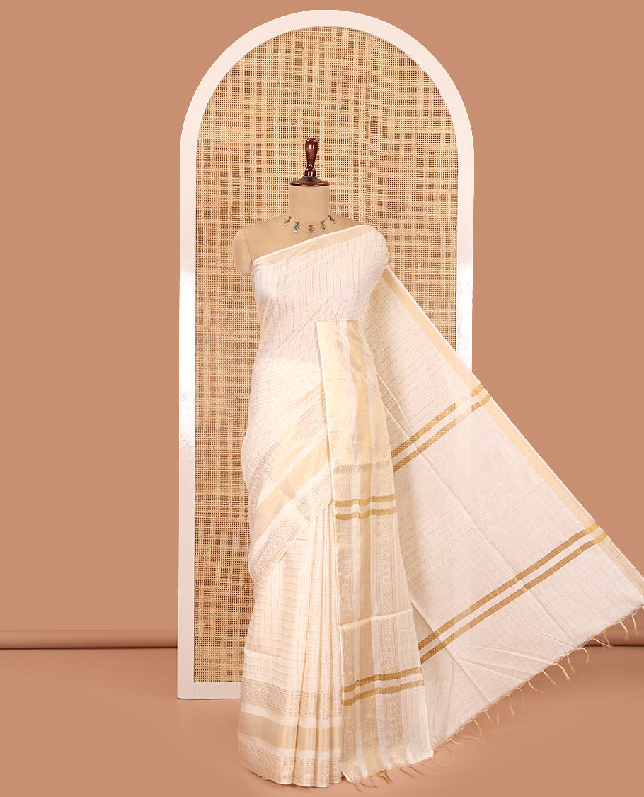 Cream Bhagalpuri Cotton Saree, Adorned with Butta Enclosed Checks, a Traditional Zari Border, and a Matching Blouse