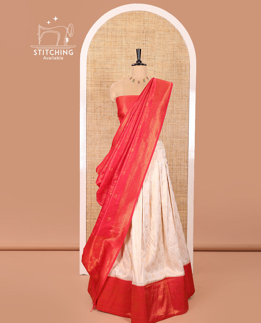 Cream and Red Banaras Softy Half-Saree Featuring Jacquard Design All Over the Skirt, Graced with a Contrast Geometric Zari Design Border, Paired with a Jacquard Blouse, and a Banaras Softy Dhavani with Floral Jaal Jacquard Design