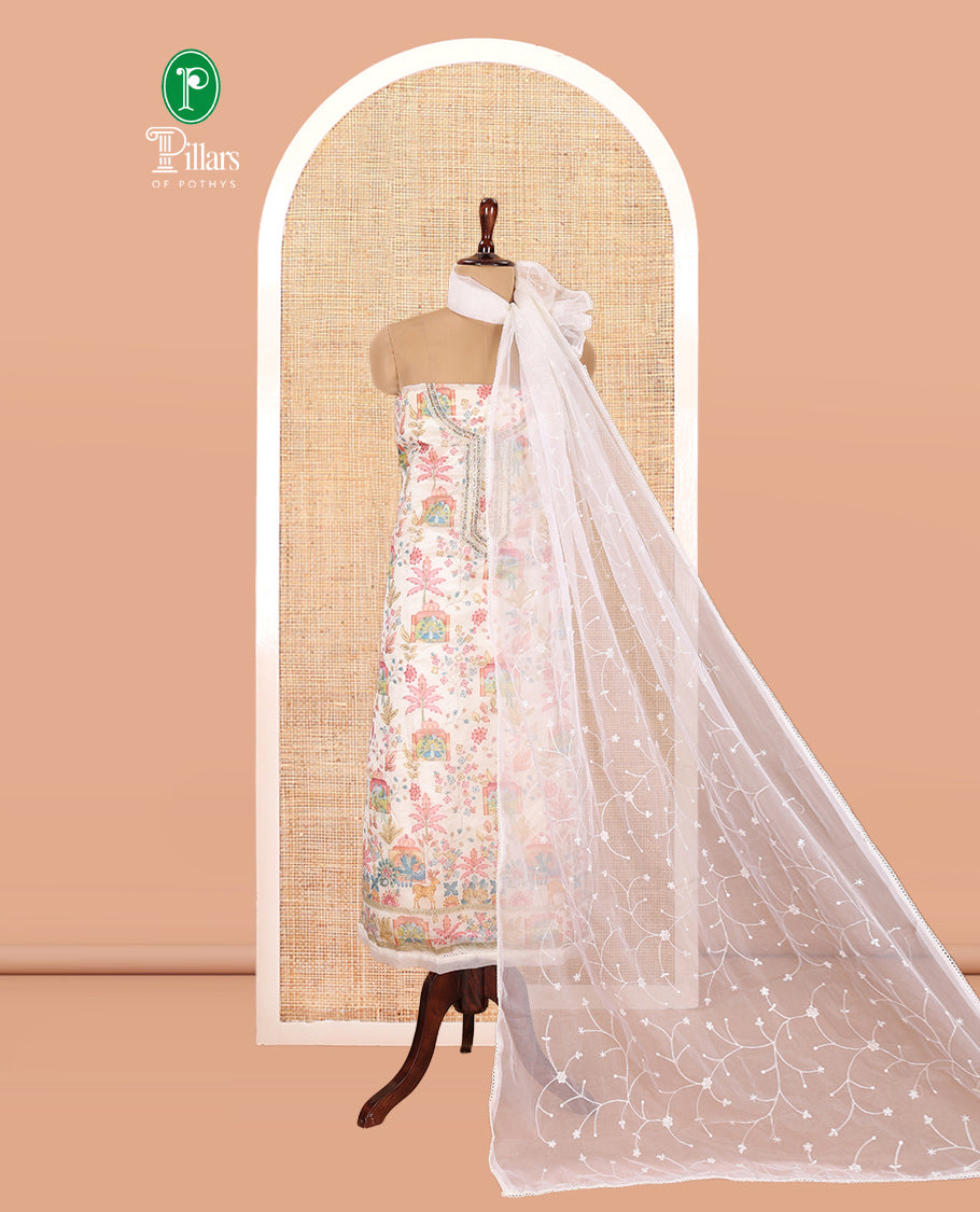 Cream Organza Material Churidar, Intricately Printed Outlined Embroidery Top, a Matching Bottom, and a Floral Embroidered Dupatta