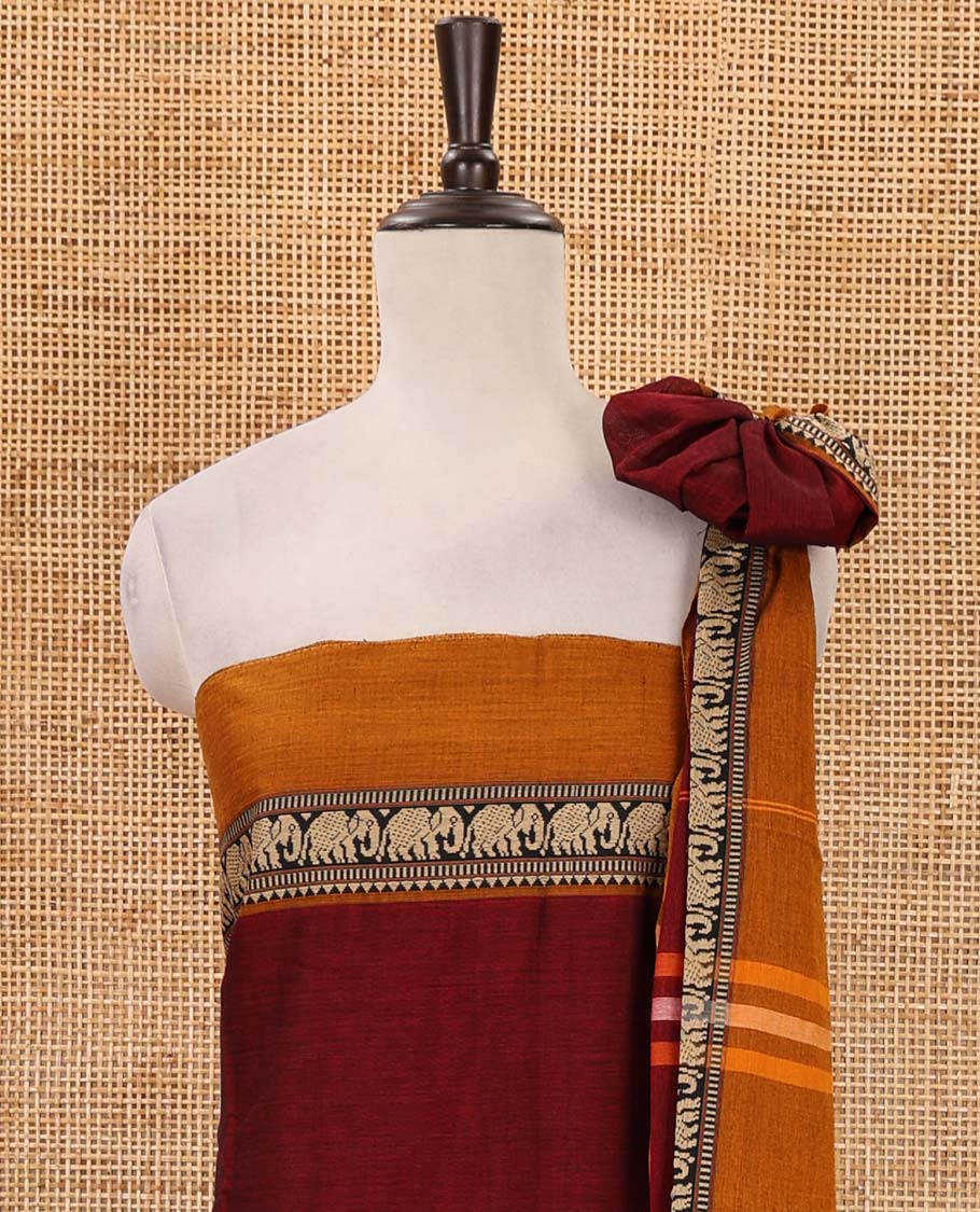 Maroon mercerised cotton material chudidar set, contrast elephant motifs border top, matching bottom & elephant motifs border dupatta