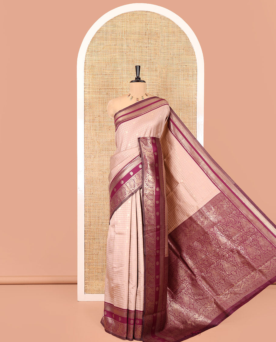 Beige Litchi Saree Features Buttas and Checks, Contrast Traditional Peacock Border, Intricate Pallu, and a Contrast Blouse