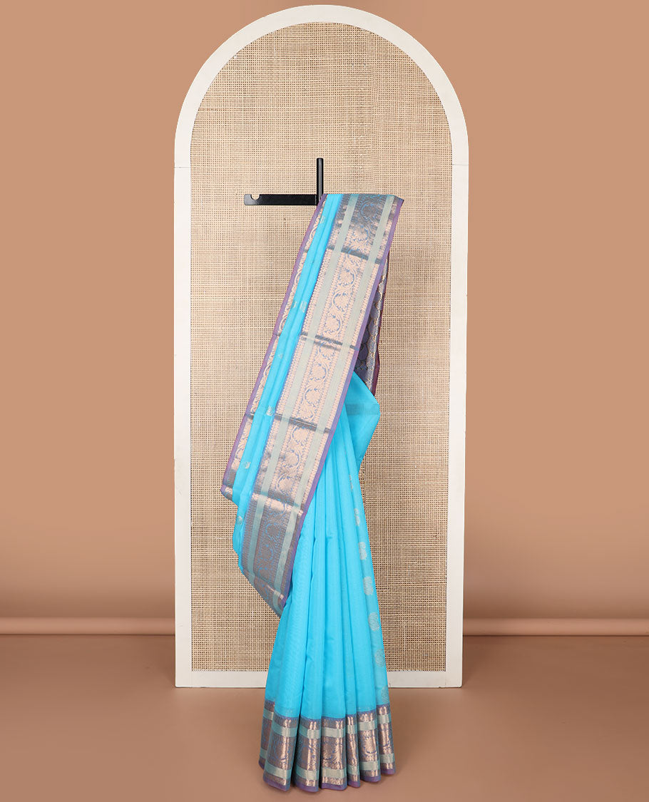 Sky blue motifs silk cotton saree with contrast zari design border & paisley design pallu