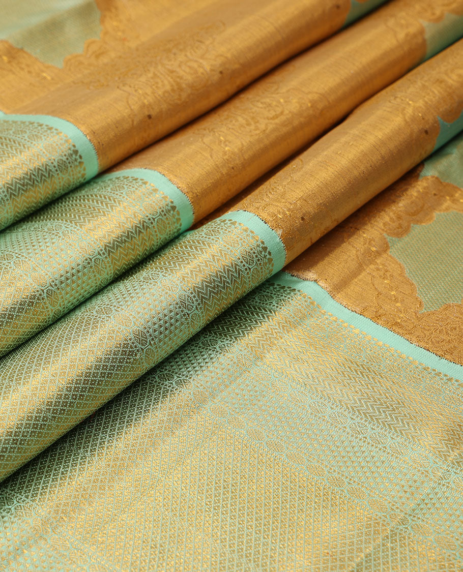 Gold meenakari jacquard silk saree, contrast border of vanki,mayil kann, ara maadam,muthu & rudraksham designs & intricate pallu
