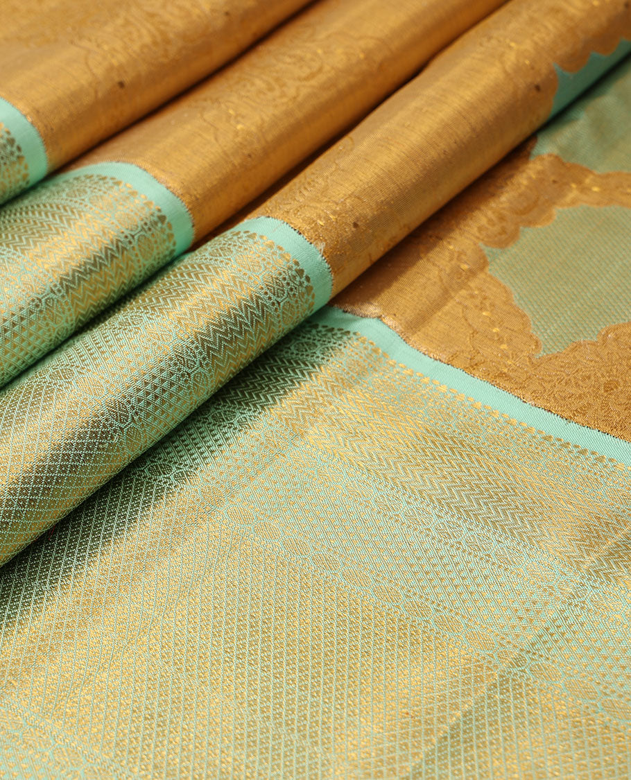 Gold meenakari jacquard silk saree, contrast border of vanki,mayil kann, ara maadam,muthu & rudraksham designs & intricate pallu