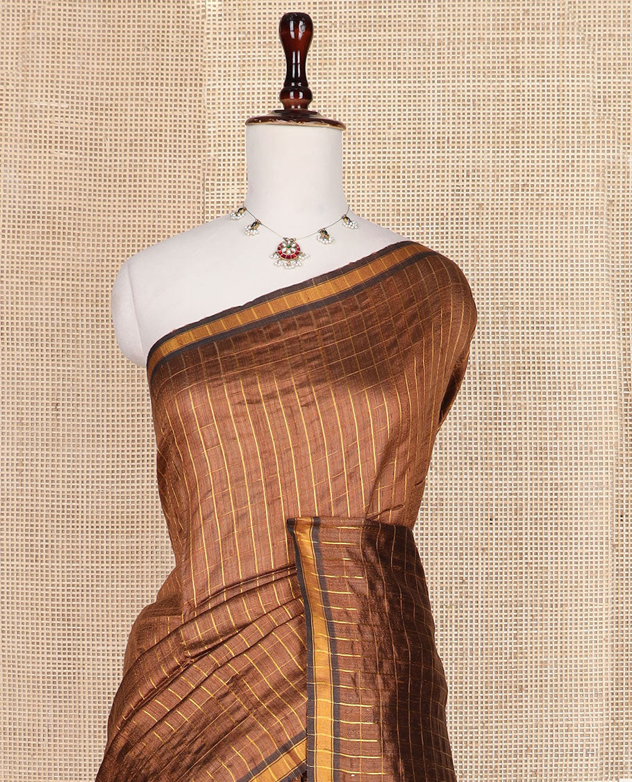 Brown checked tussar silk saree, zari border and contrast striped pallu
