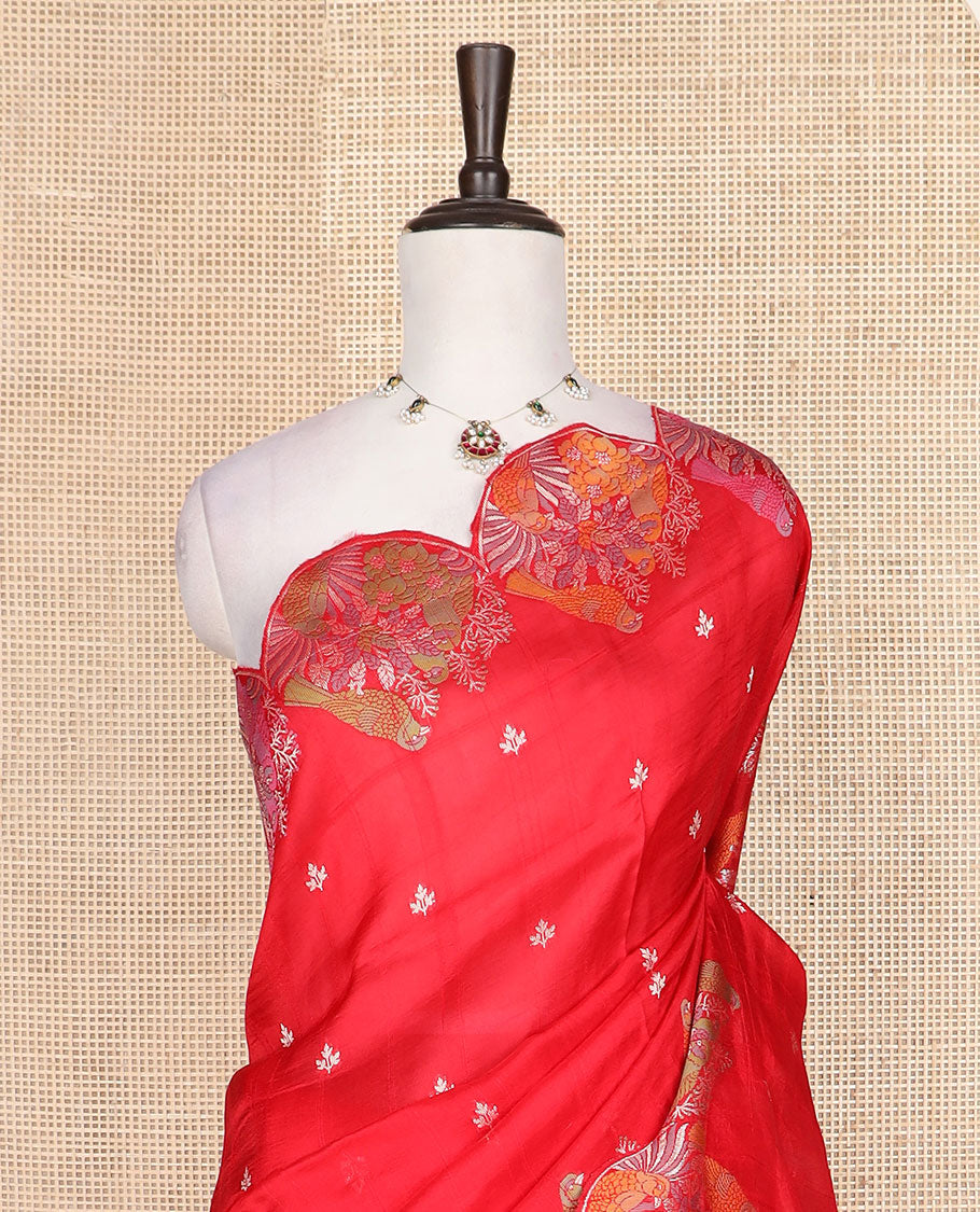 Red Matka silk saree features rudraksham motifs, scallop floral motifs and bird embossed thread embroidery border