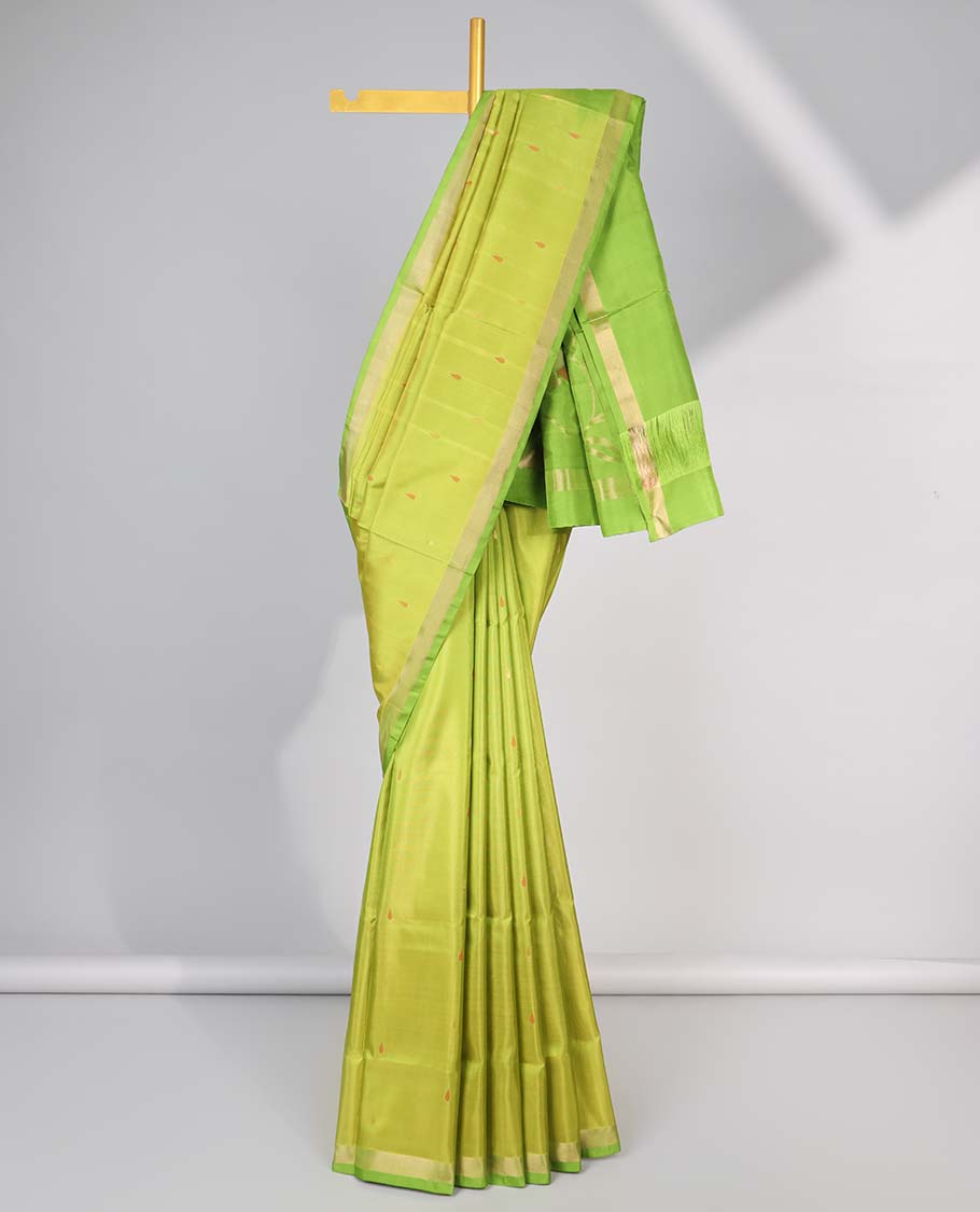 Light green floral motifs upadda silk saree with self zari border & floral vine design pallu