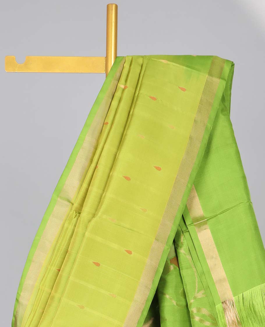 Light green floral motifs upadda silk saree with self zari border & floral vine design pallu