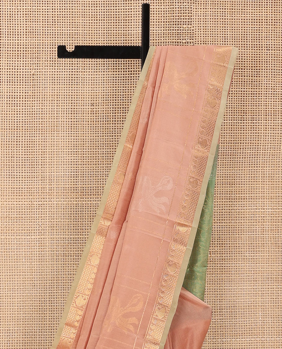 Pastel Pink Uppada Silk Saree Woven with Floral Buttas, Captivating Contrast Border of Traditional Zari Motifs and Peacock Motifs, Pallu Depicting Floral Jaal Design, and Paired with a Contrast Zari-Bordered Blouse