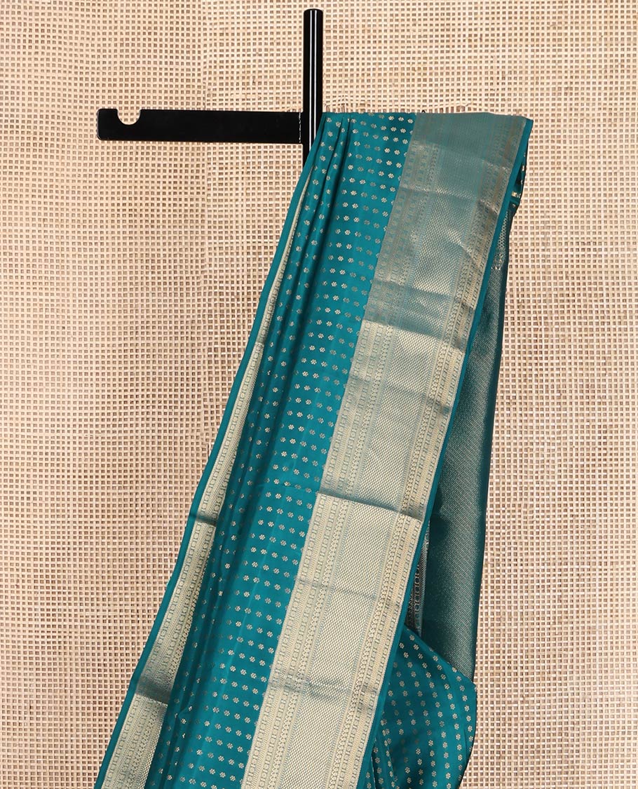 Blue Vasundhara Lite Silk Mix Saree, Embellished with Zari Buttas All Over Its Body, Highlighted by a Zari Border of Rettai Neli, Poun, Banaras, Manga, and Mayil Kann Designs, Grand Pallu, and Paired with a Matching Blouse