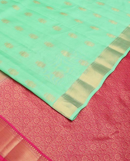 Green zari buttas Vasundhara elite silksaree, zari border of thilakam mokku, neli & zari stripes & contrast jaal pallu