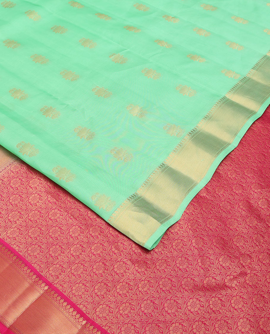 Green zari buttas Vasundhara elite silksaree, zari border of thilakam mokku, neli & zari stripes & contrast jaal pallu