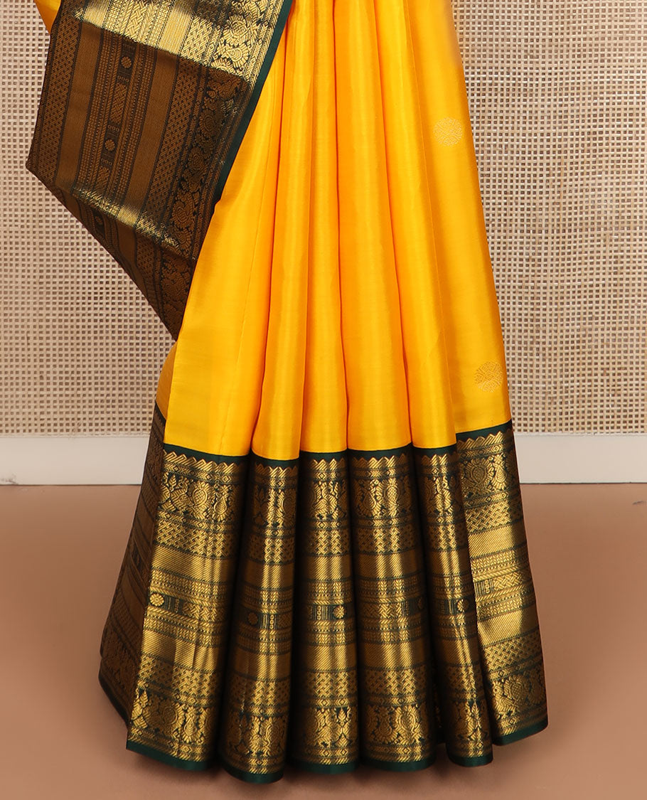 Yellow zari buttas silk saree, contrast border of rekku,mayil,paiyadi kann,banaras,vanki & kamalam & jaal pallu