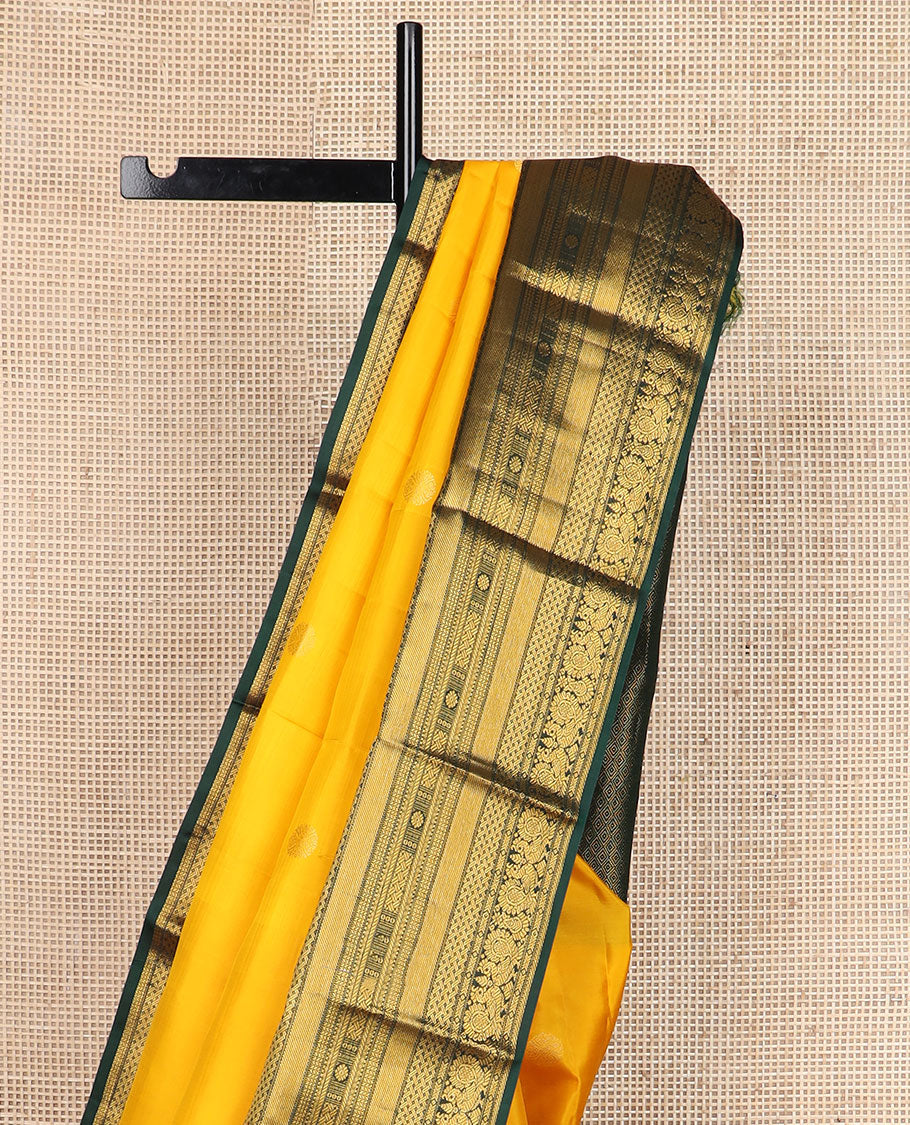 Yellow zari buttas silk saree, contrast border of rekku,mayil,paiyadi kann,banaras,vanki & kamalam & jaal pallu