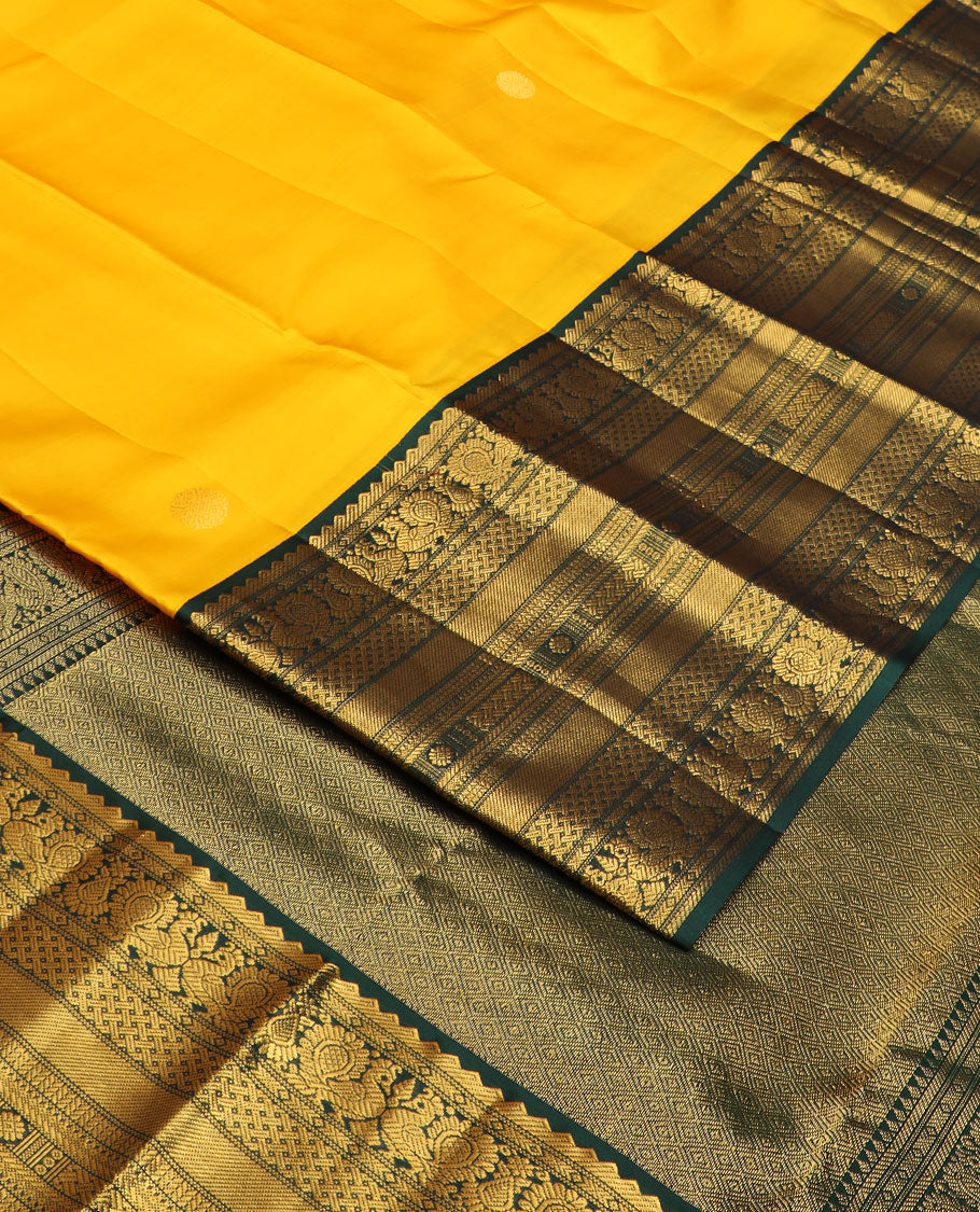 Yellow zari buttas silk saree, contrast border of rekku,mayil,paiyadi kann,banaras,vanki & kamalam & jaal pallu