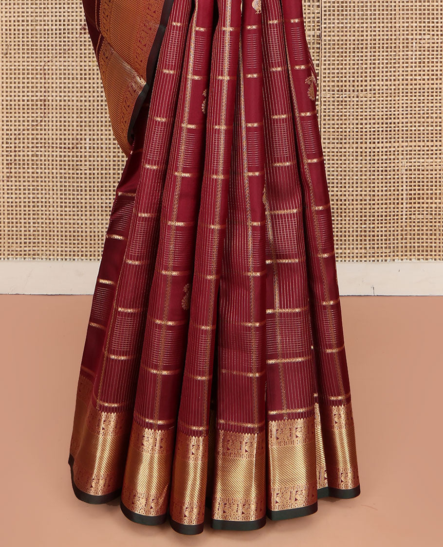 Maroon Vasundhara Silk Saree, Embellished with Zari Buttas and Zari Checks All Over Its Body, Highlighted by a Zari Border of Rekku, Kamalam, Diamond, and Mayil Designs, Diagonally Zari Striped Pallu, and Paired with a Contrast Blouse