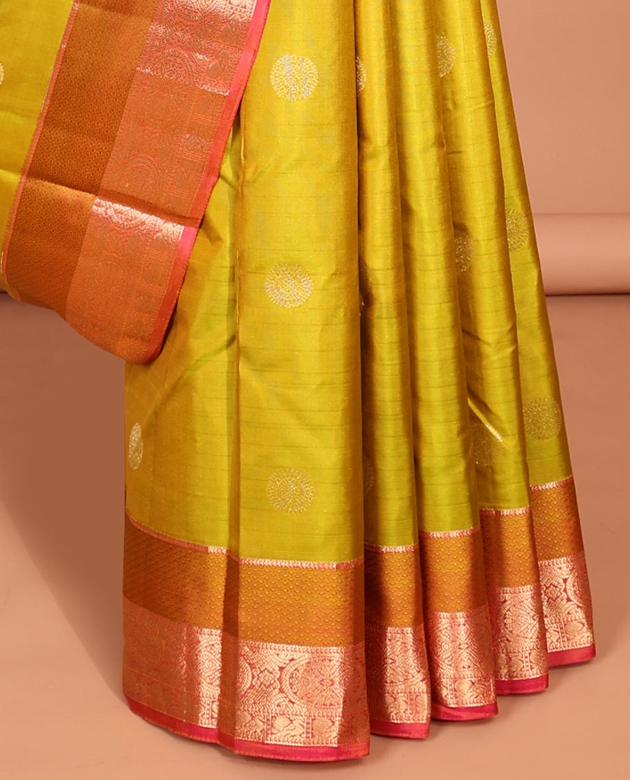 Green chakram buttas silk saree, contrast border of chakram,mayil & mayil kann & intricate pallu