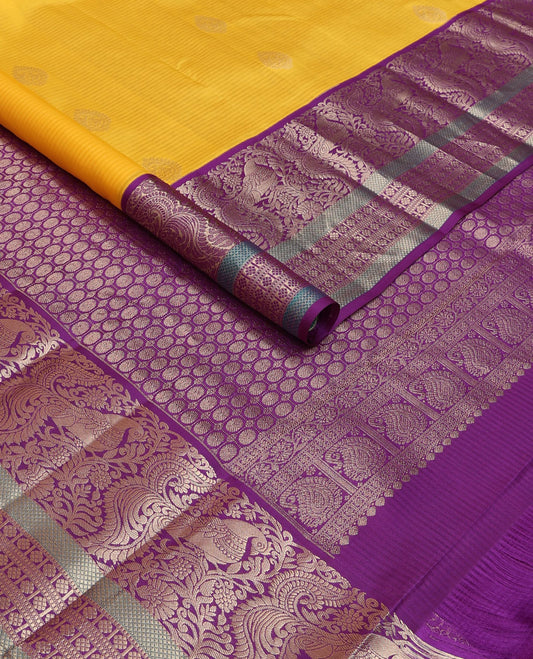 Yellow vazhaipoo stripes & buttas silk saree,contrast chakra enclosed checks pallu & border of kodi visiry,mayil,muthu,kuyil kann & laddu kamalam