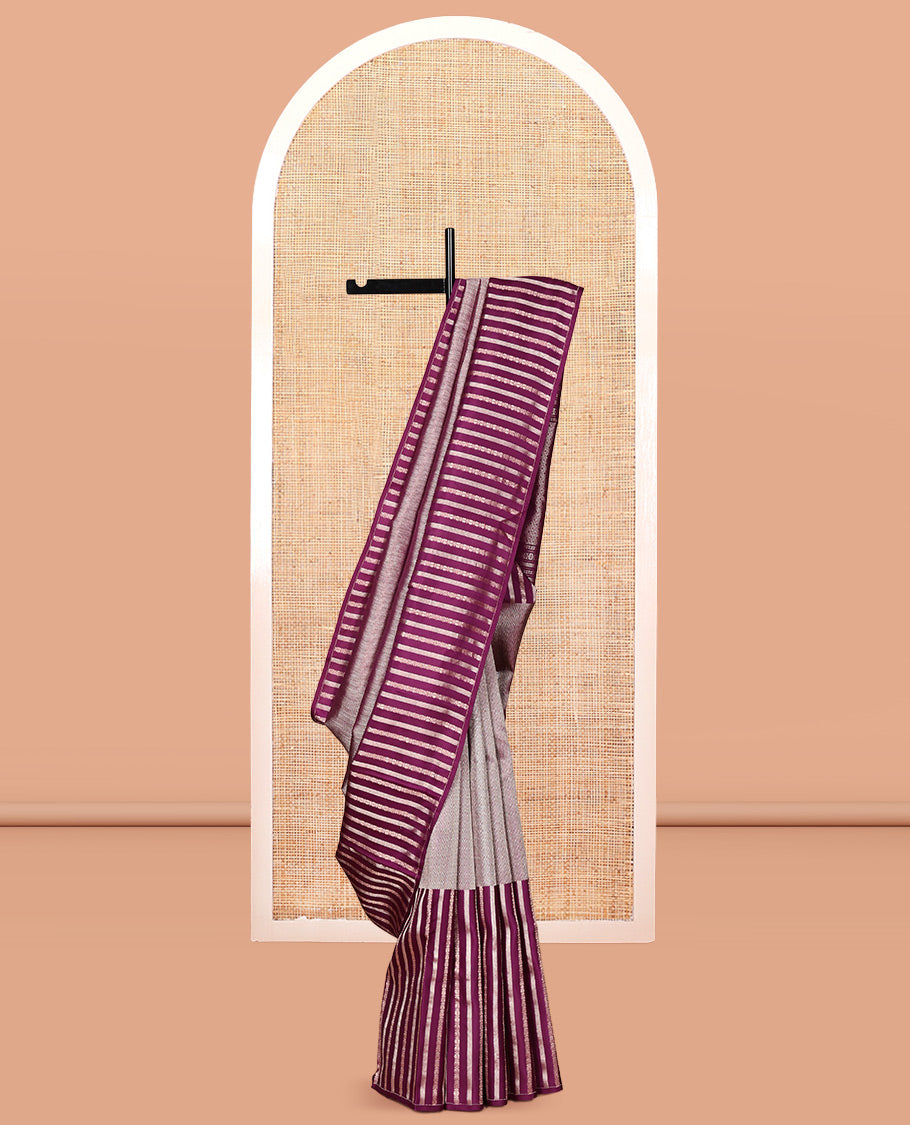 Borderless Purple Vasundhara Silk Saree, Styled with Vanki and Zari Stripes, Highlighted by a Grand Pallu, and Matching Blouse