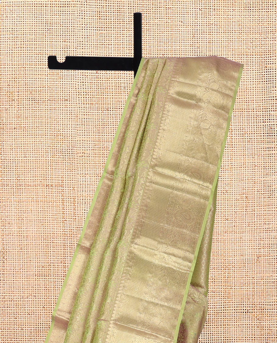 Green Kanchipuram Wedding Silk Saree, Detailed with Jacquard Design, a Zari Border of Thilakam, Mayil Kann, Kodi Visiry, Neli, and Manga Designs, Jaal Pallu, and a Matching Blouse