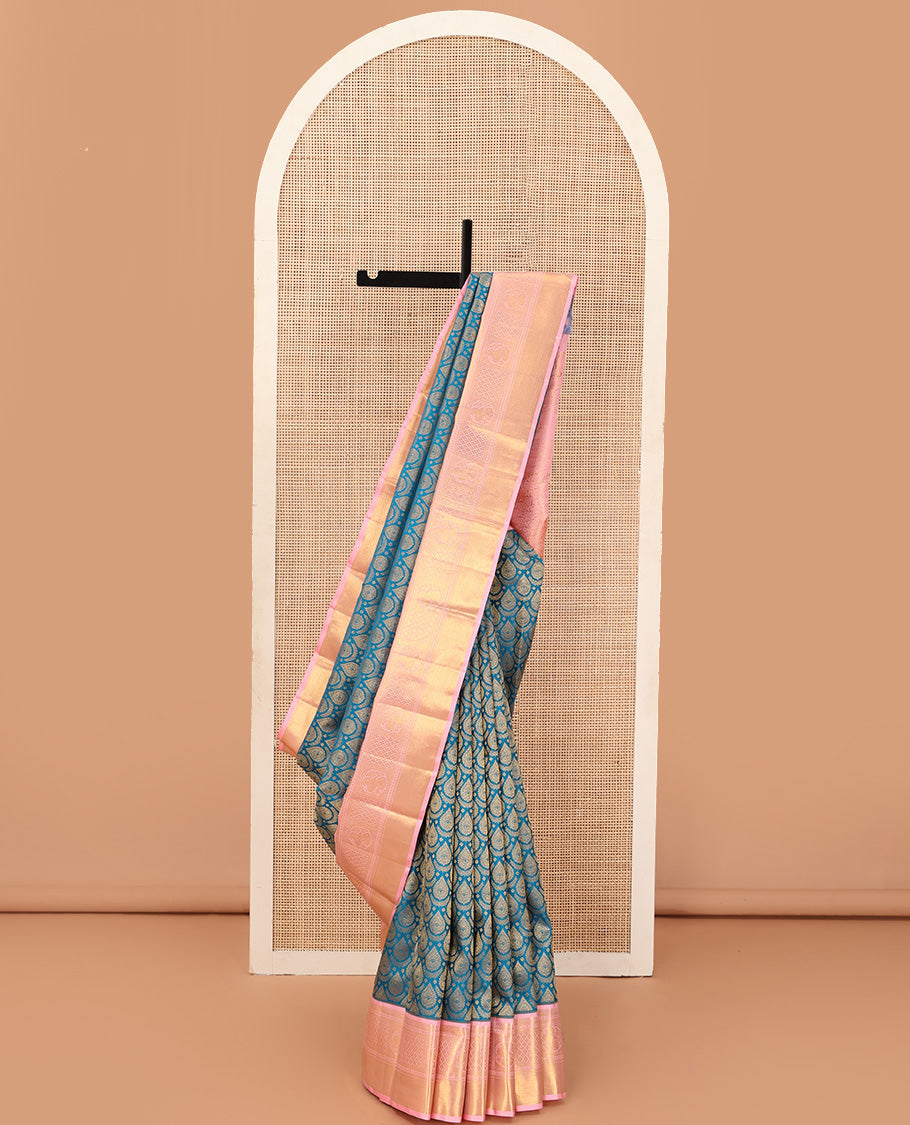 Blue jacquard wedding silk saree, contrast zari border of neli, banaras, jaal, and mayil designs, and floral design pallu