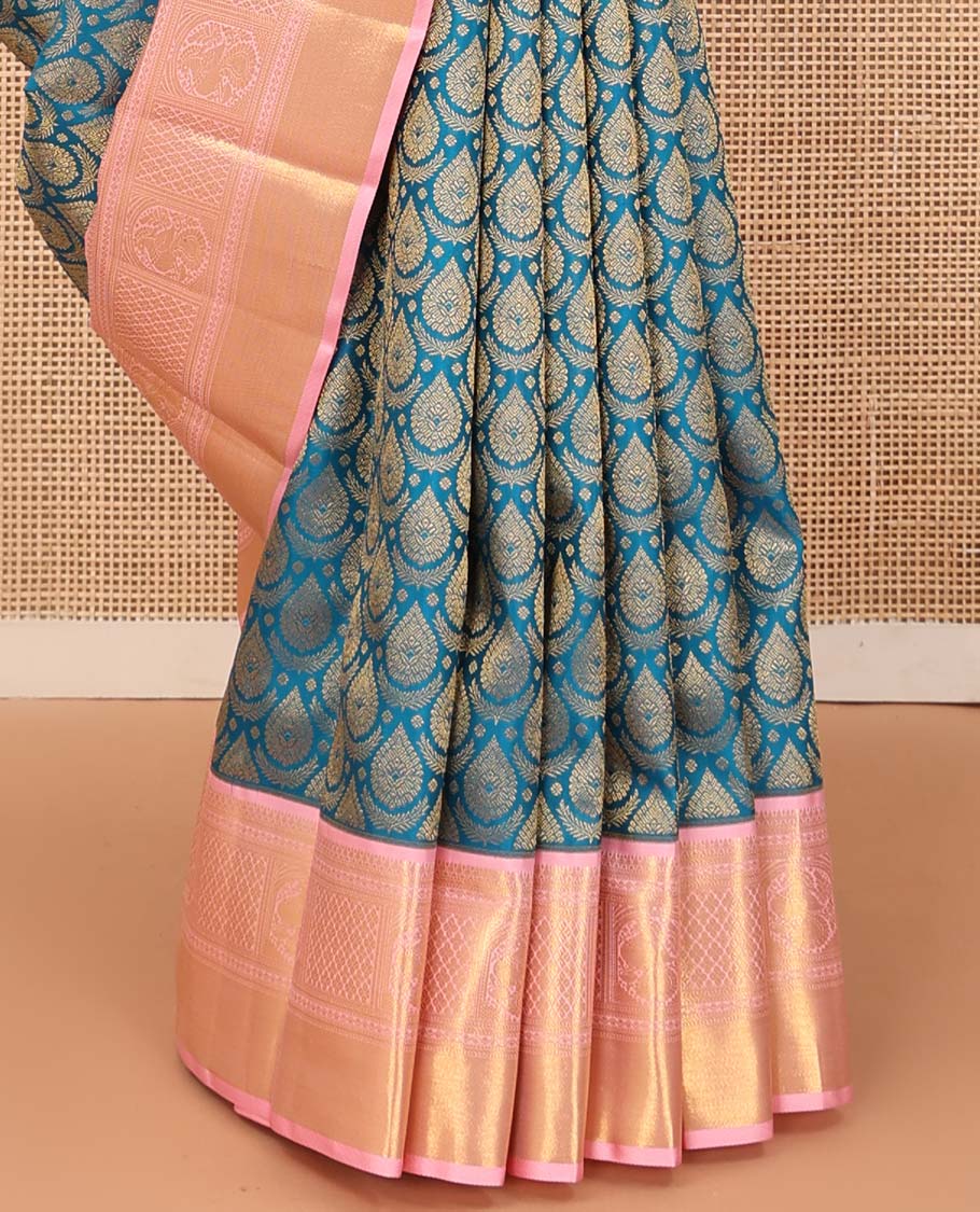 Blue jacquard wedding silk saree, contrast zari border of neli, banaras, jaal, and mayil designs, and floral design pallu