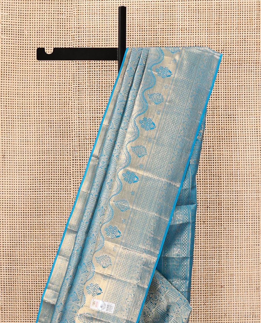 Blue Kanchipuram Wedding Silk Saree, Prettified with Jacquard Designs on Its Body, Highlighted by a Zari Border of Geometric Designs, Grand Jaal Patterned Pallu, and Paired with a Matching Blouse