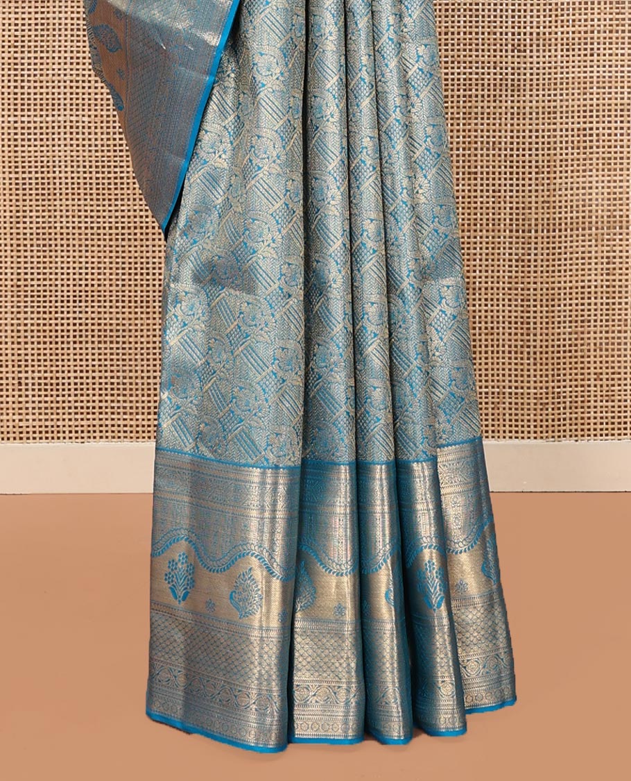 Blue Kanchipuram Wedding Silk Saree, Prettified with Jacquard Designs on Its Body, Highlighted by a Zari Border of Geometric Designs, Grand Jaal Patterned Pallu, and Paired with a Matching Blouse