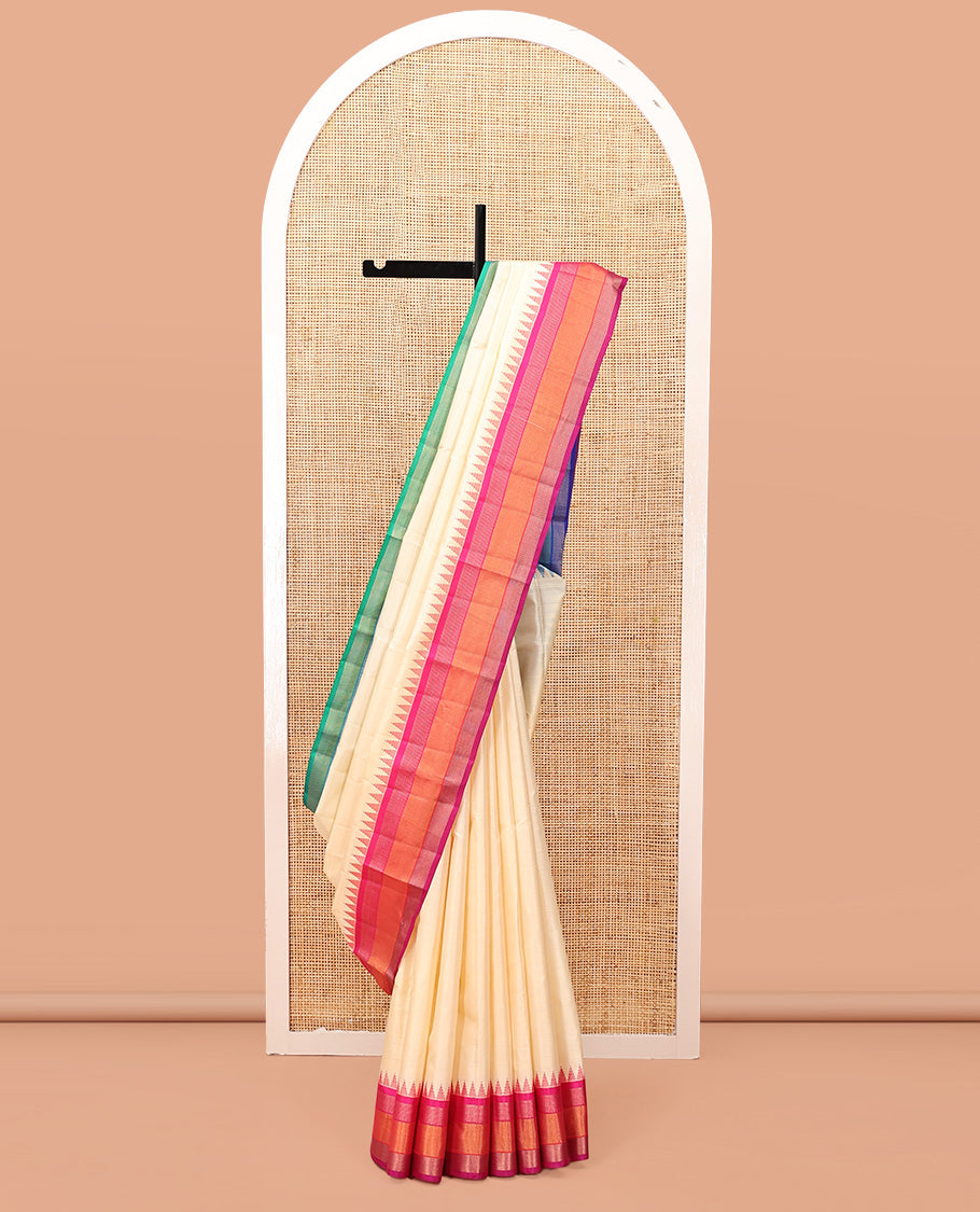Cream-Striped Bangalore Silk Saree, Complemented by a Contrast Temple Ganga-Jamuna Border, Pallu of Temple and Neli Designs, and a Contrast Blouse