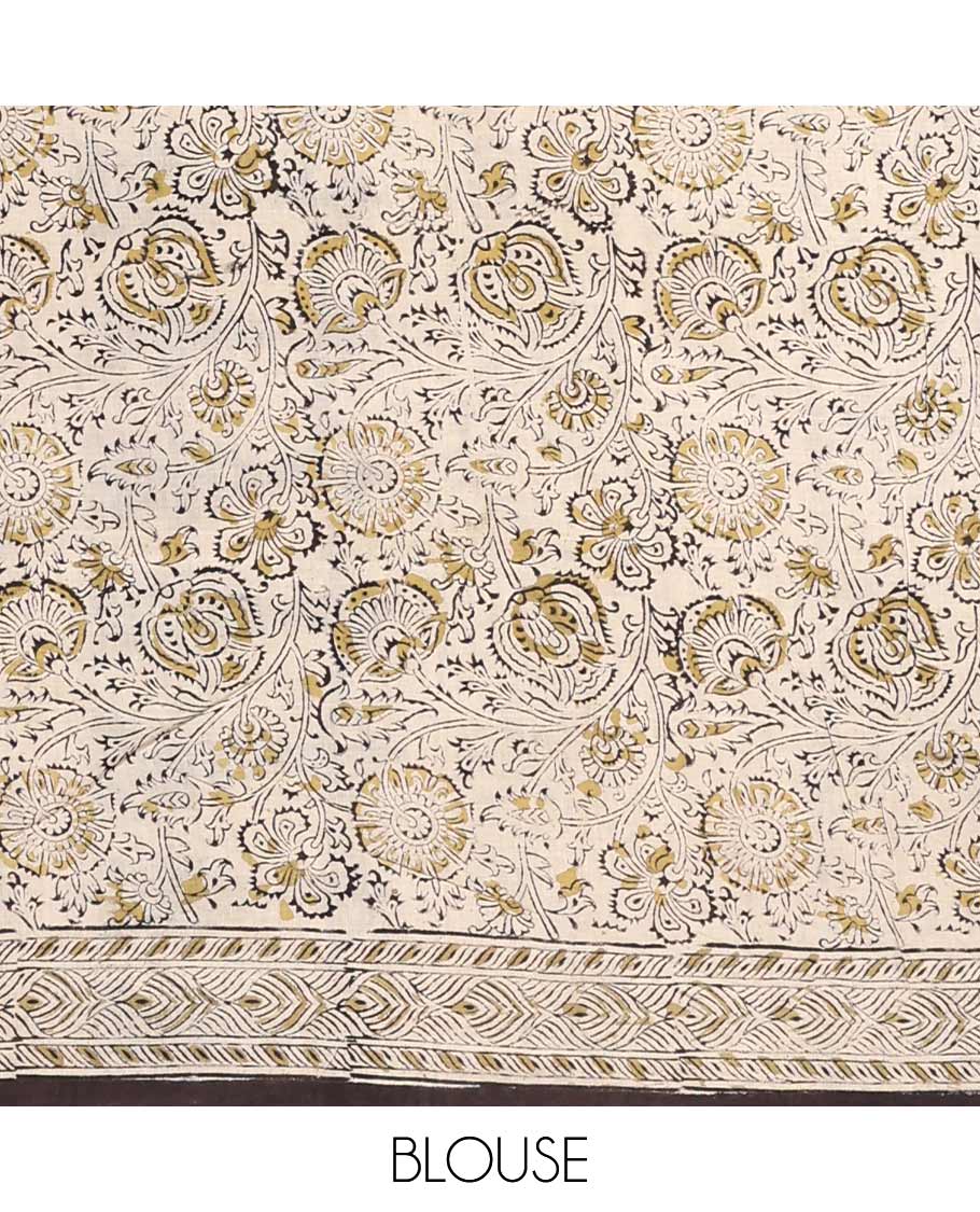 Black floral vine machine-printed Kalamkari cotton saree, geometric printed border, and pallu of intricate print