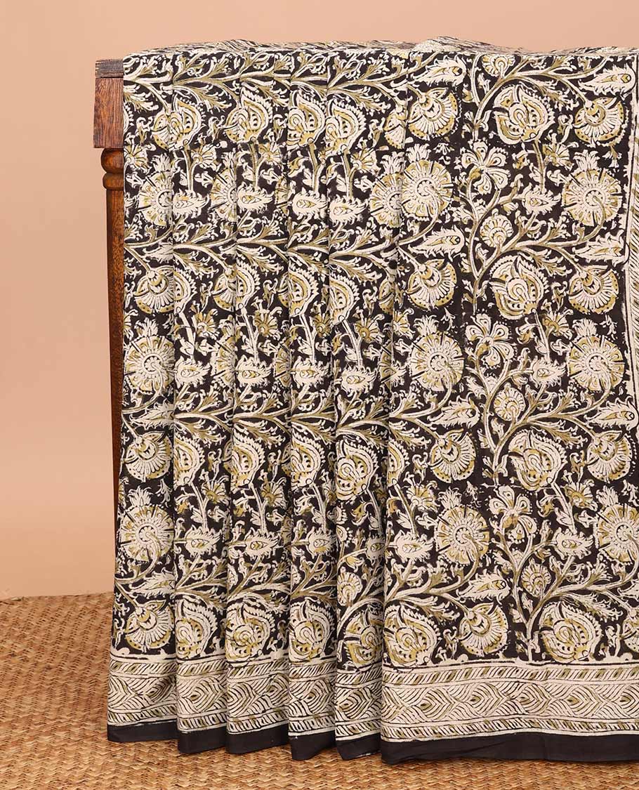 Black floral vine machine-printed Kalamkari cotton saree, geometric printed border, and pallu of intricate print