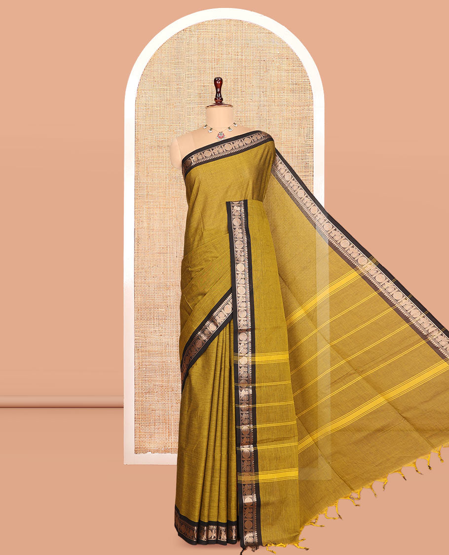 Green Plain Chettinad Cotton Saree, Complemented by a Traditional Zari Border, Striped Pallu, and a Matching Blouse