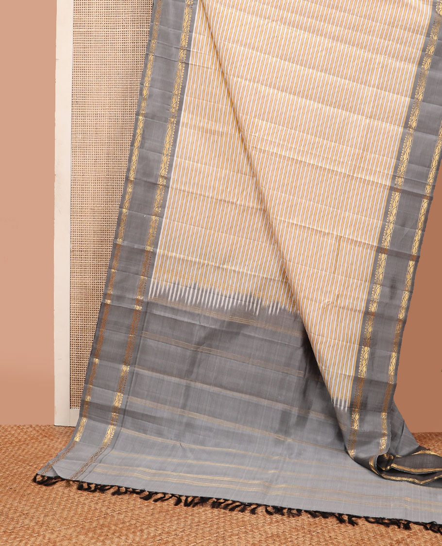 Yellow-white striped kanchipuram silk saree, contrast rettai pettu border of rekku, muthu & leaf vine & pallu of zari stripes