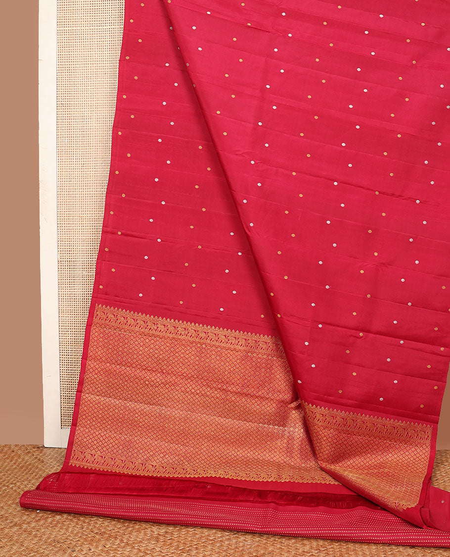 Borderless red poun buttas Kanchipuram silk saree, self-pallu of thilakam mokku, muthu, yaanai & jaal designs