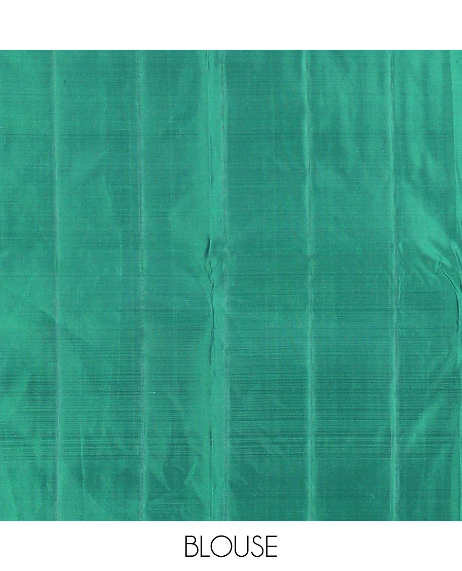 Blue zari buttas Kanchipuram silk saree, contrast leaf motifs zari border, and floral zari design pallu