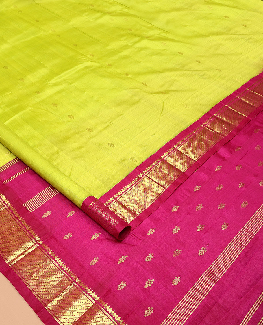 Green Kanchipuram Silk Saree, Meticulously Crafted with Zari Buttas All Over Its Body, Complemented by a Contrast One-Sided Korvai Border of Thilakam Mokku, and Puli Nagam Designs, Pallu of Zari Designs, and Comes Without a Blouse