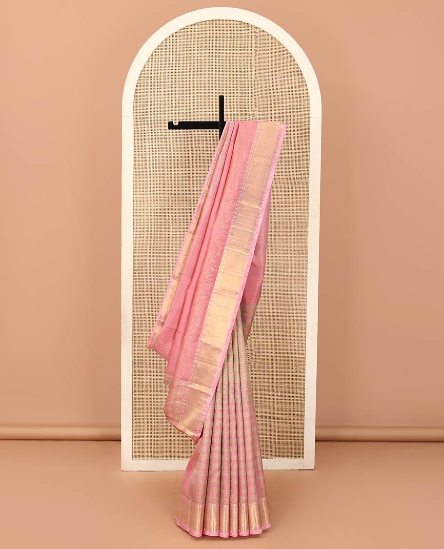 Pink floral motifs woven Kanchipuram designer saree, zari border, and zari-rich jaal pallu