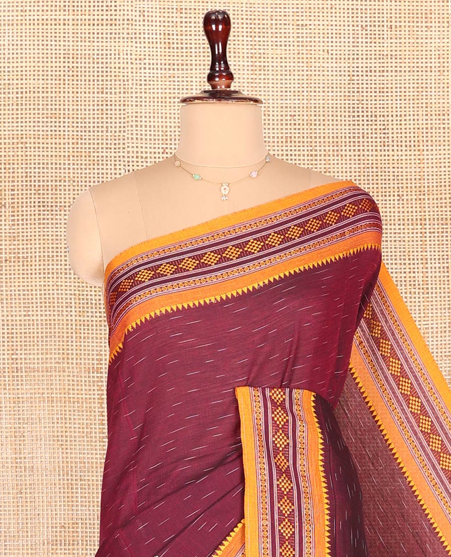 Maroon Odisha Cotton Saree, Subtly Woven with Buttas All Over the Body, Complemented by a Contrast Temple Border of Geometric Thread Patterns, Pallu Depicts Geometric Patterns, and Has No Blouse