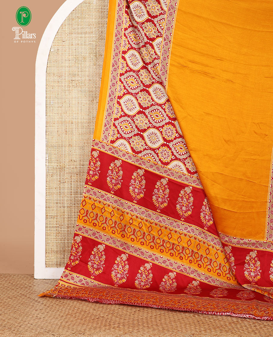 Mango yellow half-&-half style modal satin saree features floral & geometric Ajrakh printed contrast border & pallu
