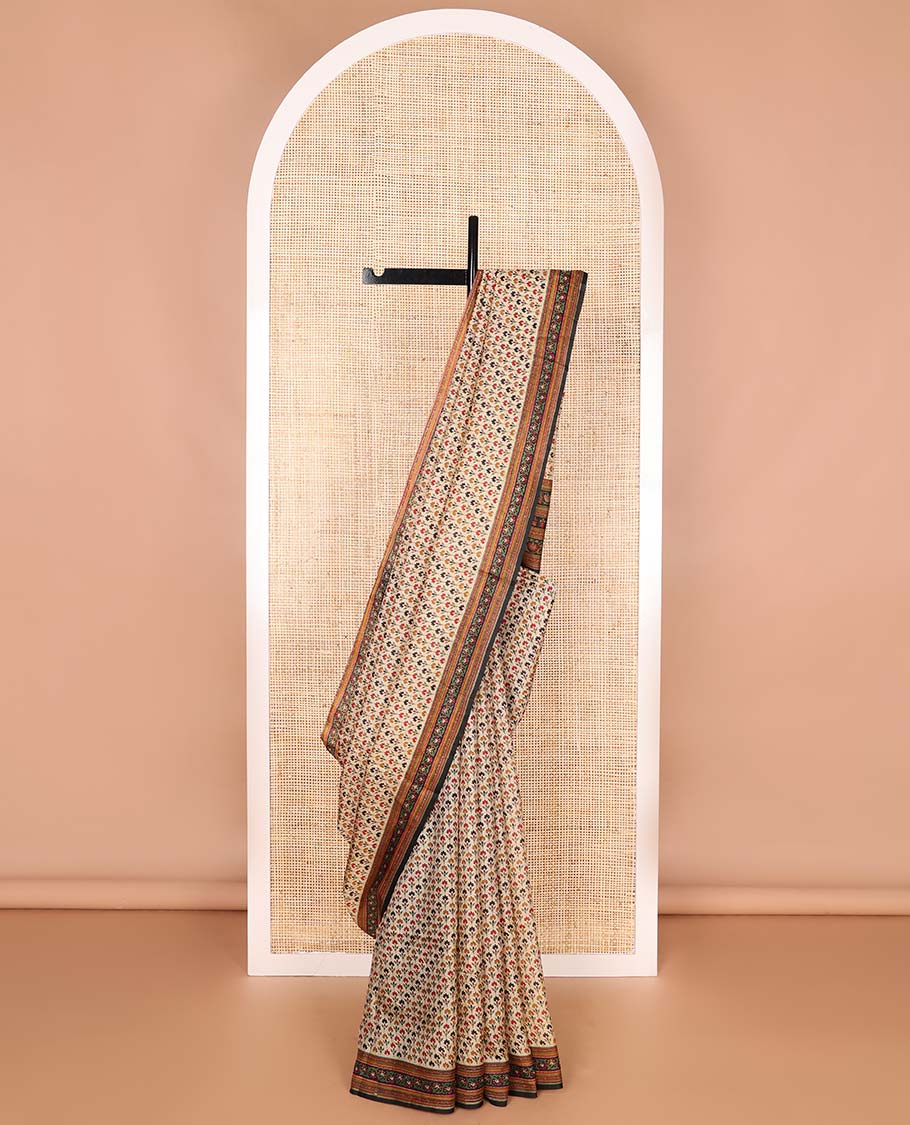 Pale brown leaf design printed silk saree with contrast floral design border & floral design pallu