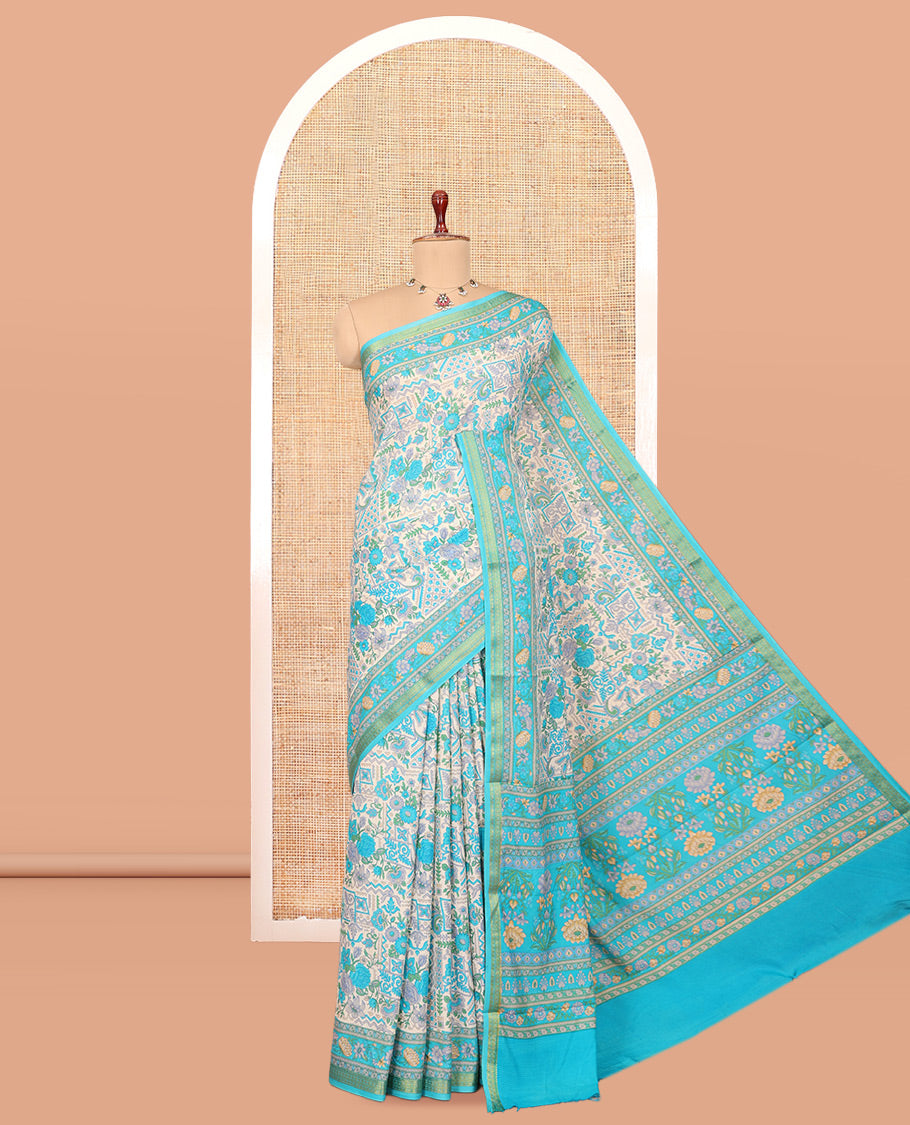 Blue Printed Silk Saree, Embellished with Intricate Floral Print, a Traditional Zari Border, Floral Pallu, and a Matching Blouse